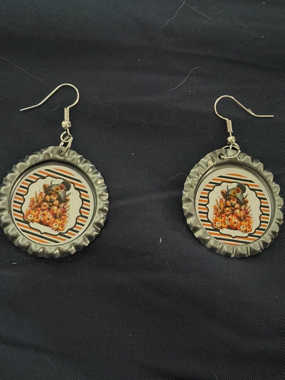 Handmade Silver-Tone Bottle Cap Earrings with Orange Floral Accent